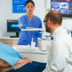 Old woman having medical treatment at dentist office