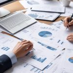 Professionals analyzing business data and reports